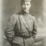 an old photo of a man in uniform