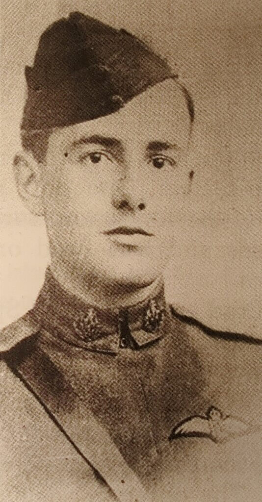 a black and white photo of a man in uniform