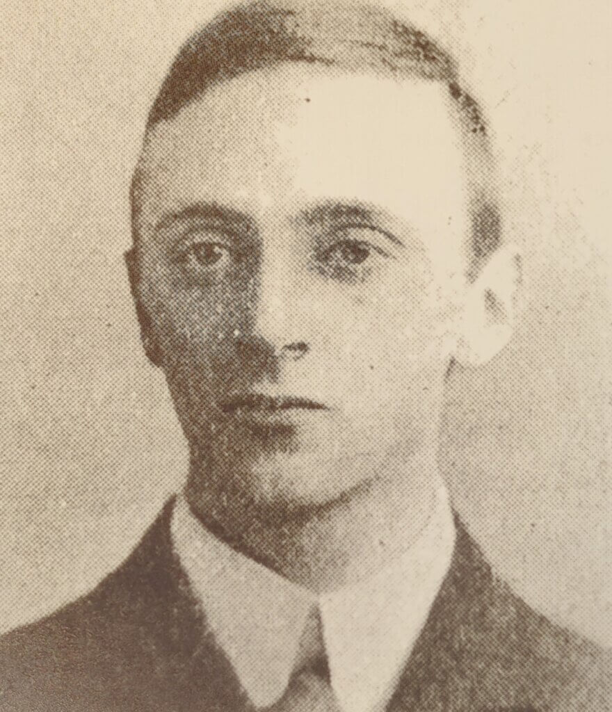 an old photo of a man in a suit and tie