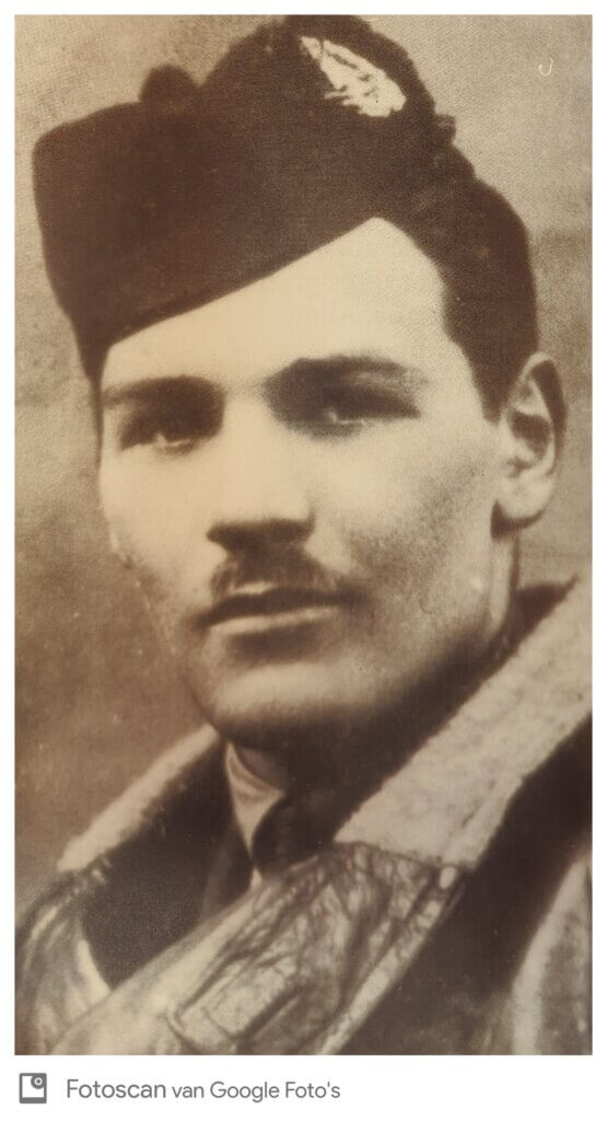 a black and white photo of a man in uniform
