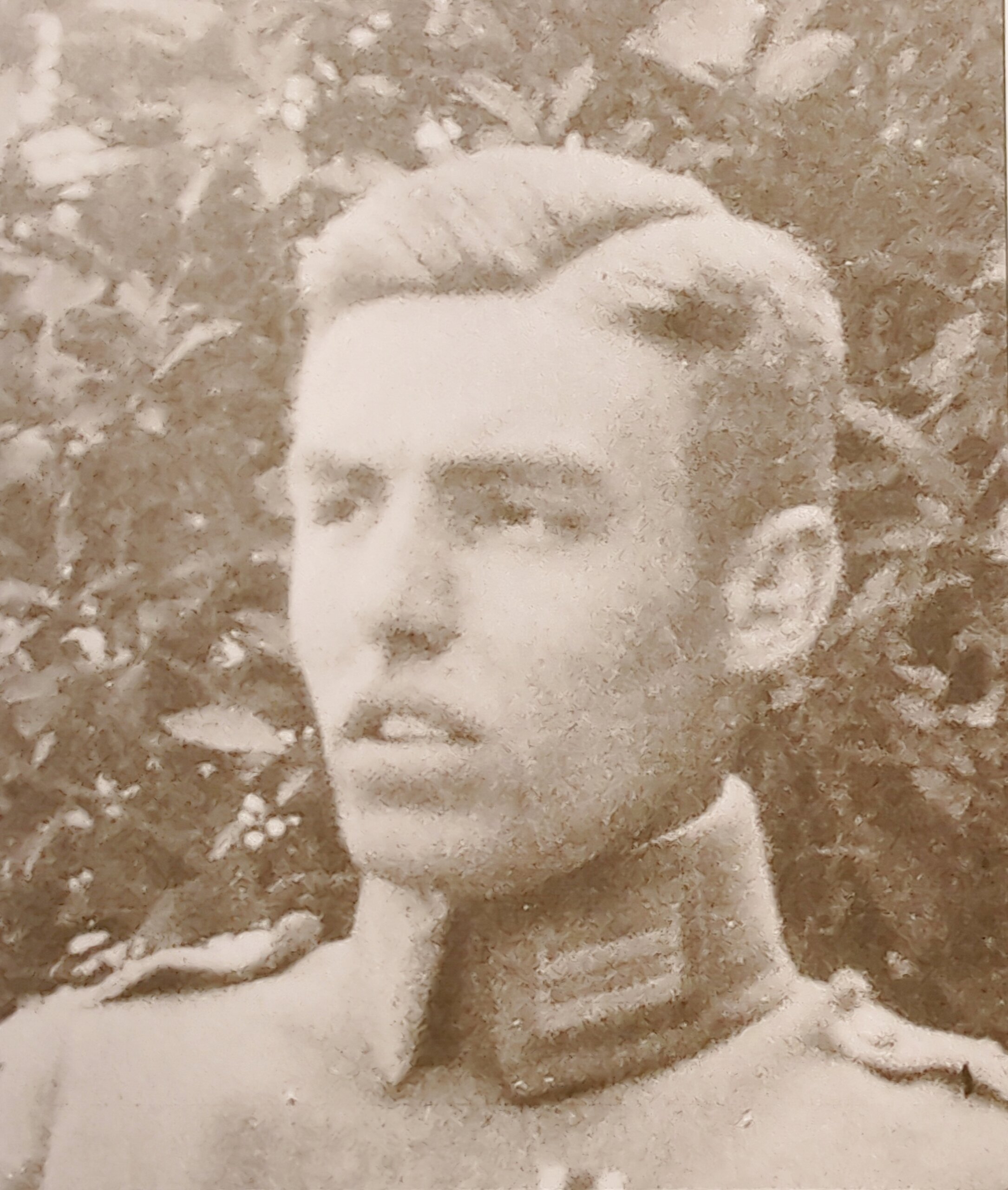 a black and white photo of a man in uniform