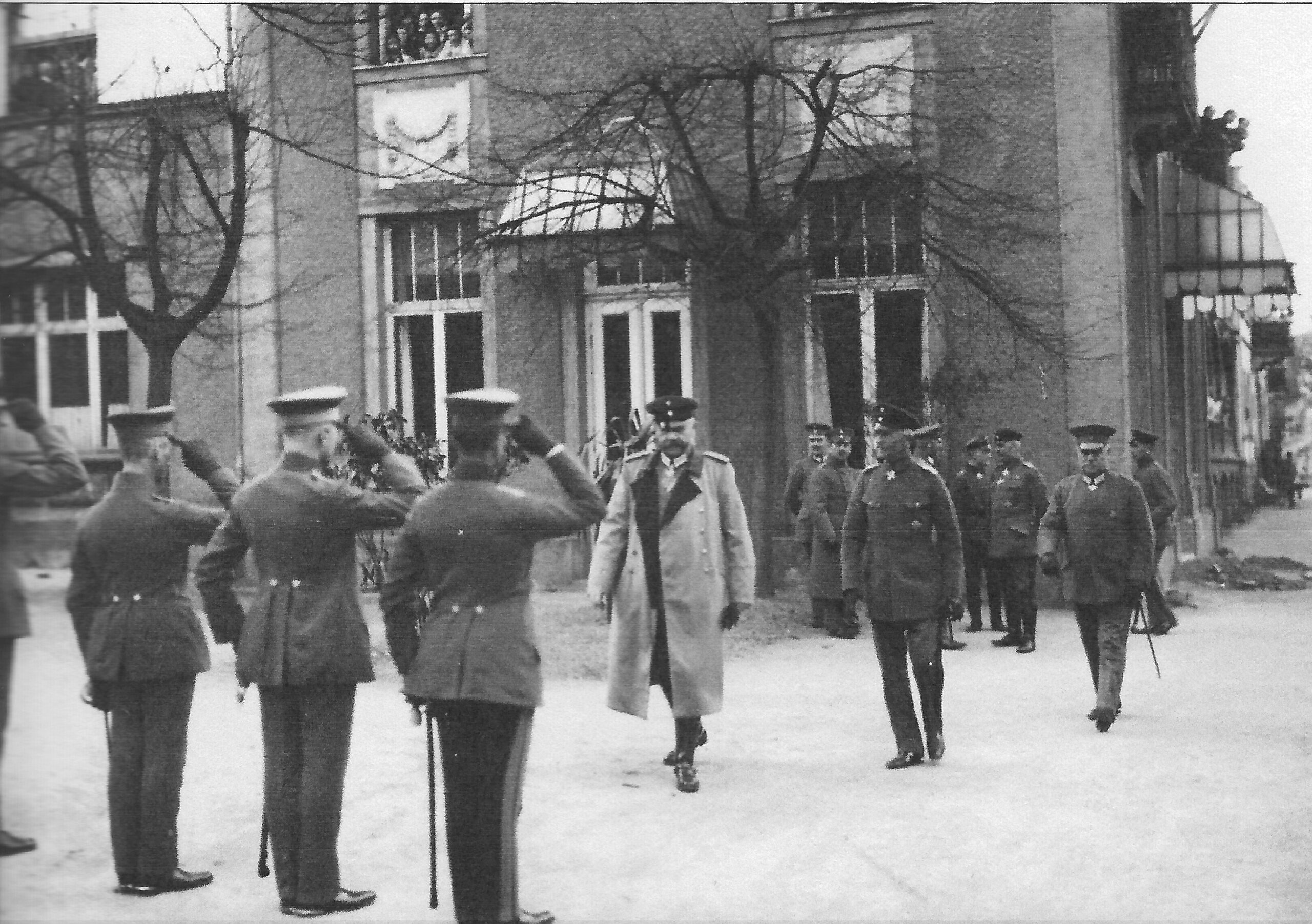 a black and white photo of a group of men in uniform