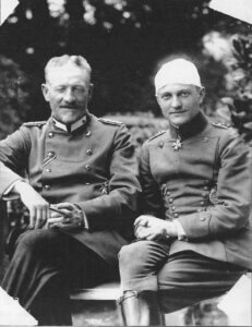 a black and white photo of two men in uniforms